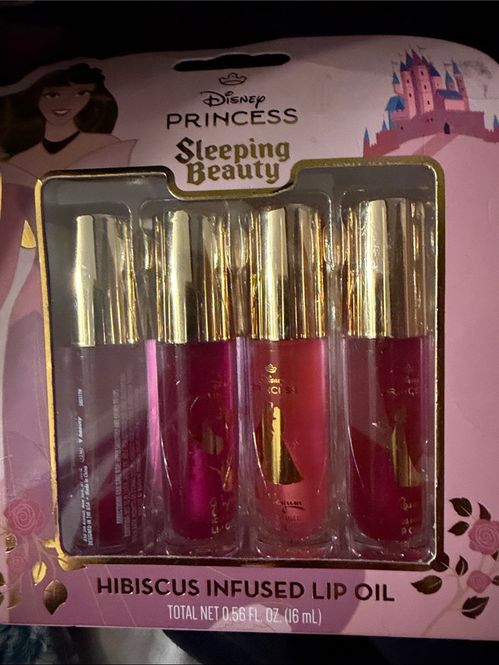 Disney Sleeping Beauty Hibiscus Lip Oil Quartet — Pink, Magenta & Red Tones